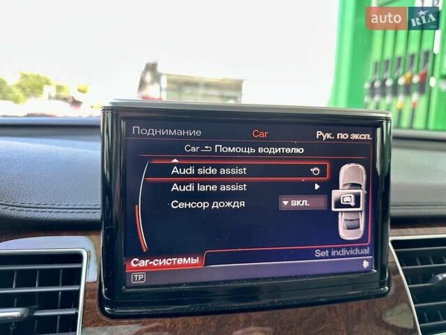 Синий Ауди А8, объемом двигателя 3 л и пробегом 230 тыс. км за 13777 $, фото 32 на Automoto.ua