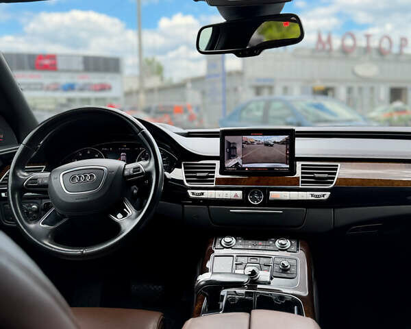 Синий Ауди А8, объемом двигателя 3 л и пробегом 55 тыс. км за 31400 $, фото 5 на Automoto.ua