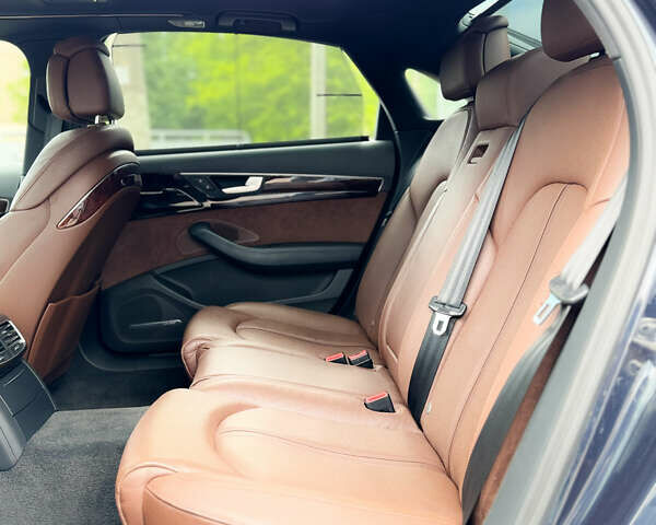 Синий Ауди А8, объемом двигателя 3 л и пробегом 55 тыс. км за 31400 $, фото 3 на Automoto.ua