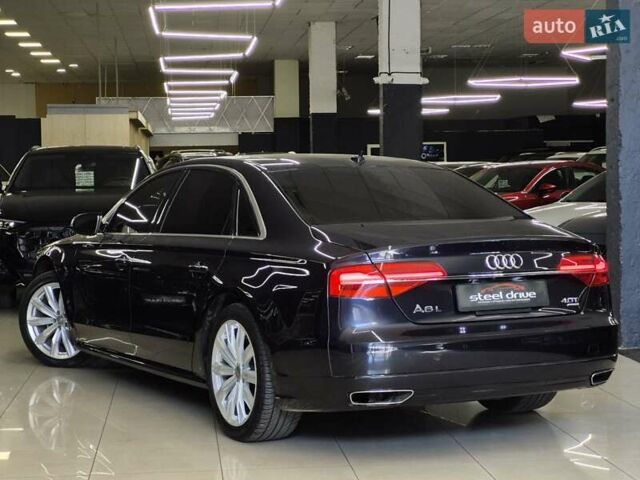 Синий Ауди А8, объемом двигателя 4 л и пробегом 239 тыс. км за 23499 $, фото 1 на Automoto.ua
