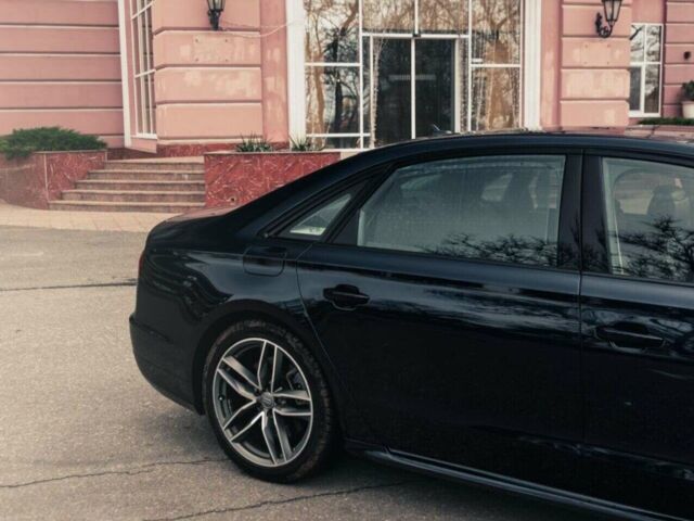 Синий Ауди А8, объемом двигателя 3 л и пробегом 136 тыс. км за 27000 $, фото 4 на Automoto.ua
