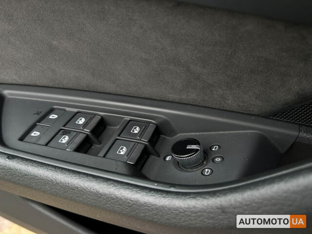 Синий Ауди E-Tron, объемом двигателя 95 л и пробегом 124 тыс. км за 26999 $, фото 16 на Automoto.ua