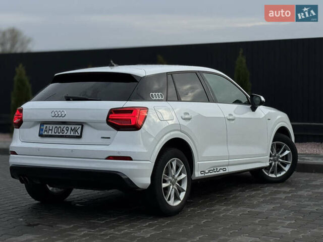 Білий Ауді Ку2, об'ємом двигуна 2 л та пробігом 50 тис. км за 27999 $, фото 5 на Automoto.ua