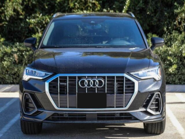 Черный Ауди Ку3, объемом двигателя 2 л и пробегом 14 тыс. км за 14500 $, фото 1 на Automoto.ua