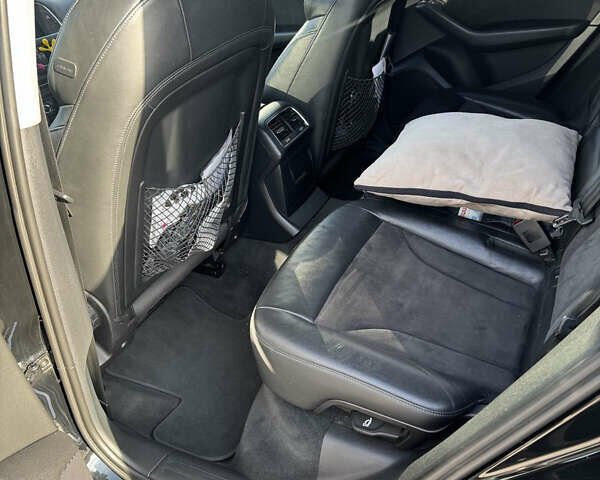 Черный Ауди Ку 5, объемом двигателя 1.97 л и пробегом 296 тыс. км за 18500 $, фото 7 на Automoto.ua