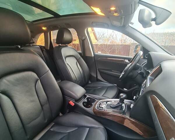 Серый Ауди Ку 5, объемом двигателя 1.98 л и пробегом 99 тыс. км за 18000 $, фото 7 на Automoto.ua