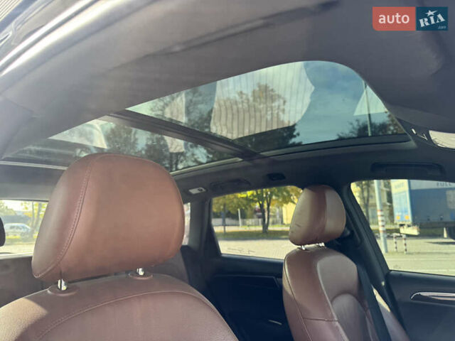 Синий Ауди Ку 5, объемом двигателя 2 л и пробегом 213 тыс. км за 12000 $, фото 6 на Automoto.ua