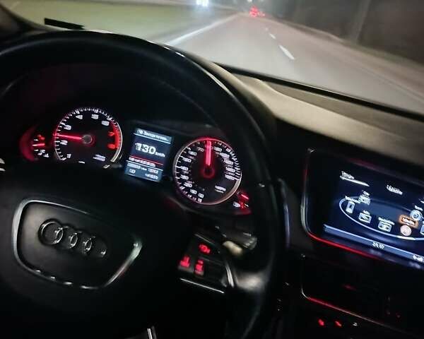 Синий Ауди Ку 5, объемом двигателя 1.98 л и пробегом 261 тыс. км за 12800 $, фото 7 на Automoto.ua