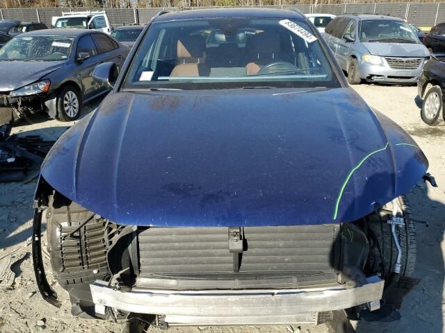 Синий Ауди Ку 5, объемом двигателя 2 л и пробегом 25 тыс. км за 27900 $, фото 1 на Automoto.ua