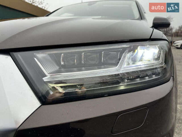 Коричневый Ауди Ку 7, объемом двигателя 2.97 л и пробегом 215 тыс. км за 40000 $, фото 1 на Automoto.ua