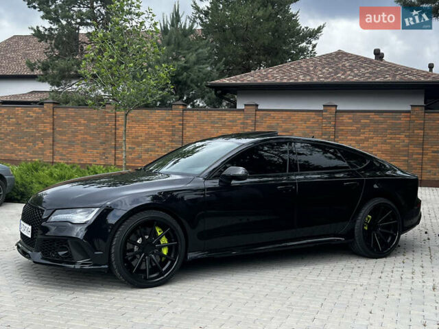 Черный Ауди РС7, объемом двигателя 4 л и пробегом 133 тыс. км за 38000 $, фото 5 на Automoto.ua