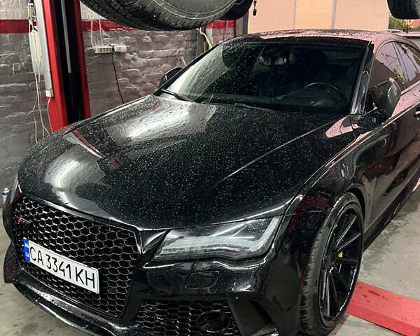Черный Ауди РС7, объемом двигателя 4 л и пробегом 133 тыс. км за 38000 $, фото 83 на Automoto.ua