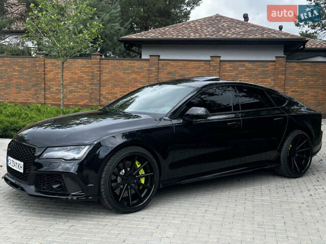 Черный Ауди РС7, объемом двигателя 4 л и пробегом 133 тыс. км за 38000 $, фото 4 на Automoto.ua