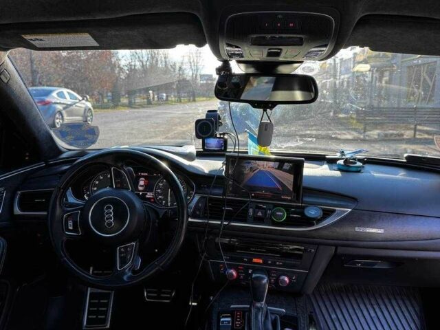 Черный Ауди С6, объемом двигателя 4 л и пробегом 128 тыс. км за 29500 $, фото 17 на Automoto.ua