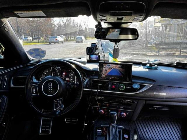 Черный Ауди С6, объемом двигателя 4 л и пробегом 128 тыс. км за 29500 $, фото 13 на Automoto.ua