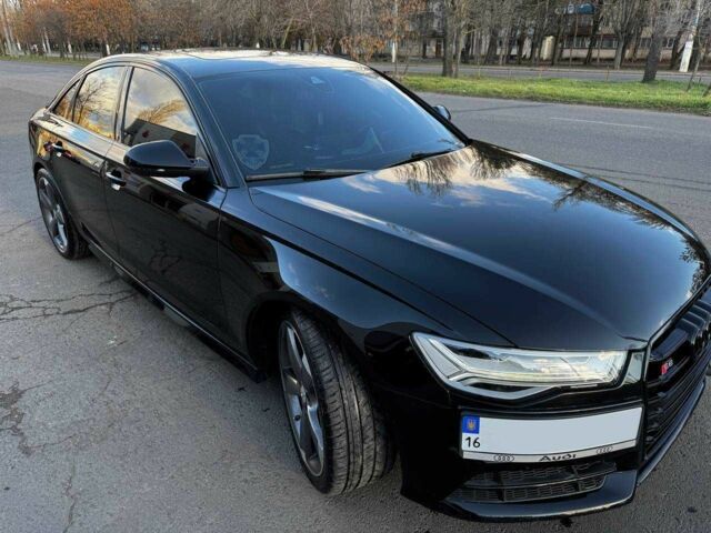 Черный Ауди С6, объемом двигателя 4 л и пробегом 128 тыс. км за 29500 $, фото 3 на Automoto.ua