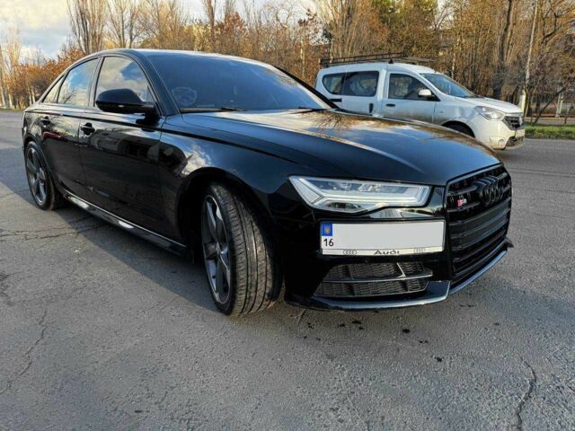 Черный Ауди С6, объемом двигателя 4 л и пробегом 128 тыс. км за 29500 $, фото 1 на Automoto.ua