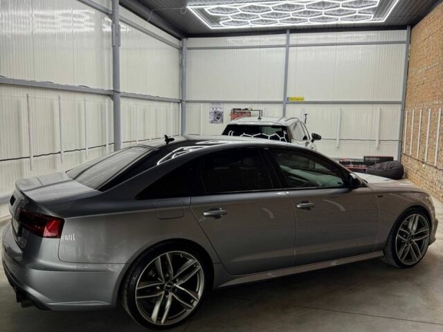 Серый Ауди С6, объемом двигателя 4 л и пробегом 110 тыс. км за 35500 $, фото 4 на Automoto.ua