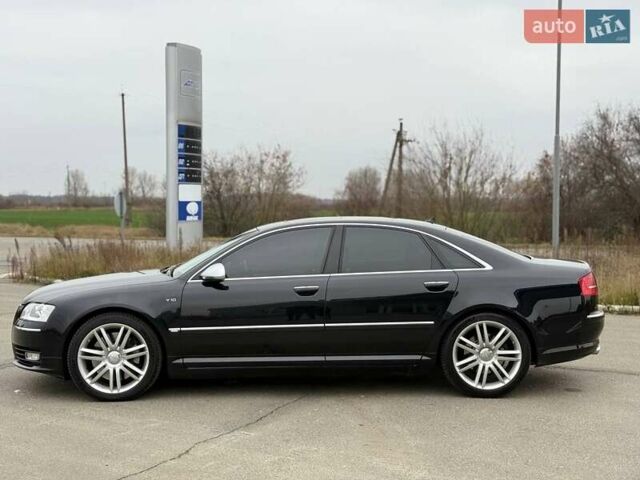 Черный Ауди С8, объемом двигателя 5.2 л и пробегом 153 тыс. км за 22777 $, фото 10 на Automoto.ua