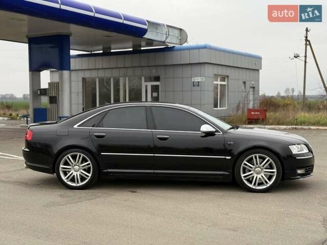 Черный Ауди С8, объемом двигателя 5.2 л и пробегом 153 тыс. км за 22777 $, фото 9 на Automoto.ua