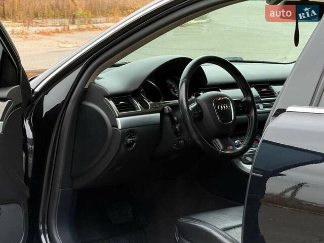 Черный Ауди С8, объемом двигателя 5.2 л и пробегом 153 тыс. км за 22777 $, фото 15 на Automoto.ua