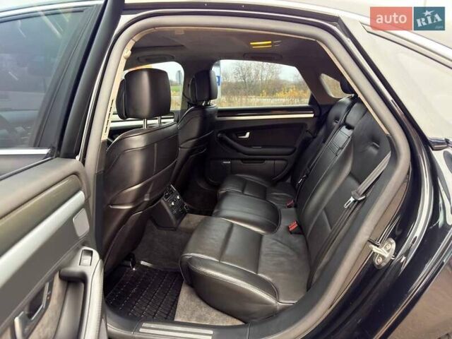 Черный Ауди С8, объемом двигателя 5.2 л и пробегом 153 тыс. км за 22777 $, фото 24 на Automoto.ua