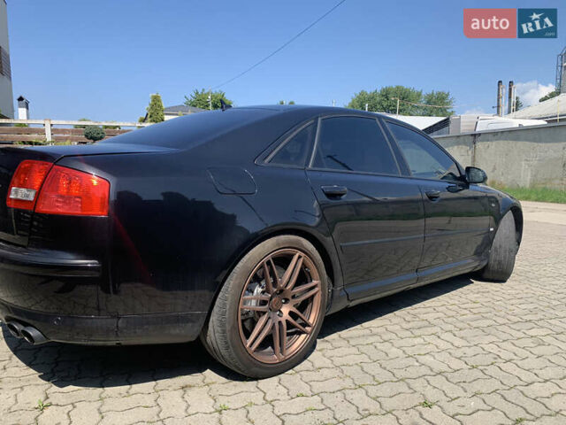 Чорний Ауді S8, об'ємом двигуна 5.2 л та пробігом 262 тис. км за 15000 $, фото 6 на Automoto.ua
