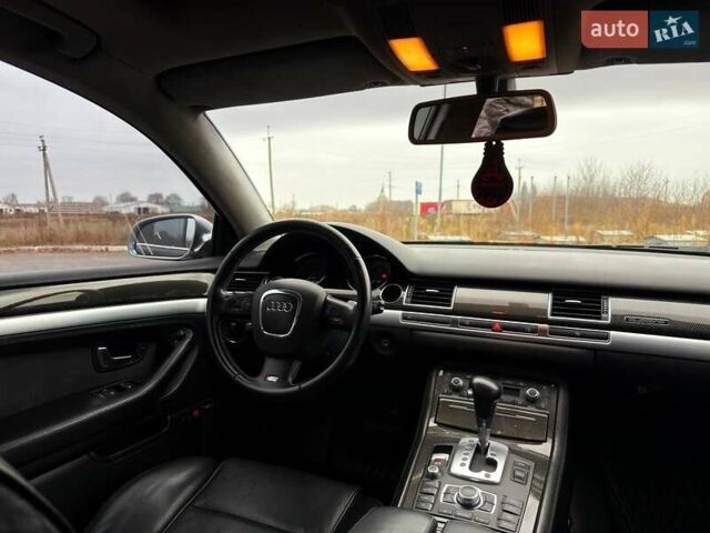 Черный Ауди С8, объемом двигателя 5.2 л и пробегом 153 тыс. км за 22777 $, фото 25 на Automoto.ua