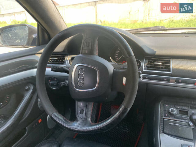 Черный Ауди С8, объемом двигателя 5.2 л и пробегом 270 тыс. км за 12999 $, фото 24 на Automoto.ua