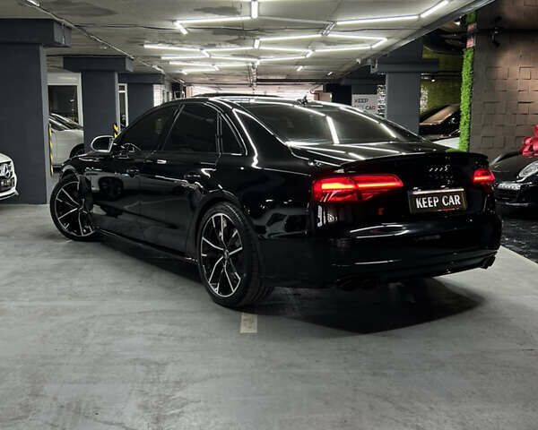 Черный Ауди С8, объемом двигателя 4 л и пробегом 205 тыс. км за 34000 $, фото 7 на Automoto.ua