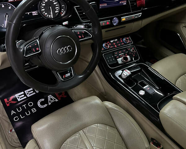 Черный Ауди С8, объемом двигателя 4 л и пробегом 205 тыс. км за 34000 $, фото 13 на Automoto.ua