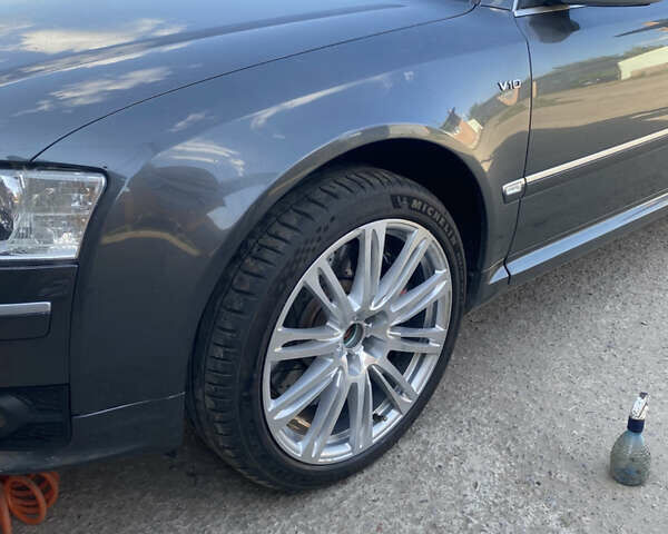 Серый Ауди С8, объемом двигателя 5.2 л и пробегом 193 тыс. км за 20500 $, фото 19 на Automoto.ua