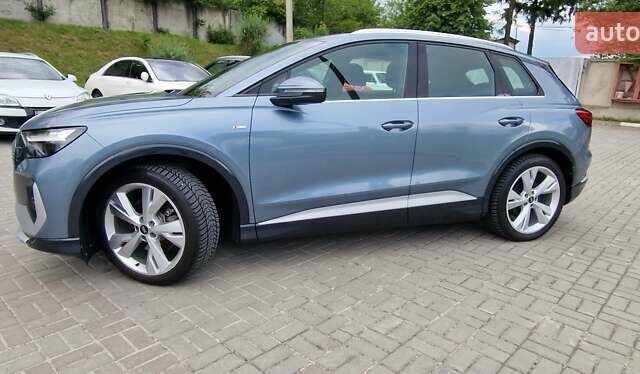 Синий Ауди Q4 e-tron, объемом двигателя 0 л и пробегом 77 тыс. км за 27999 $, фото 50 на Automoto.ua