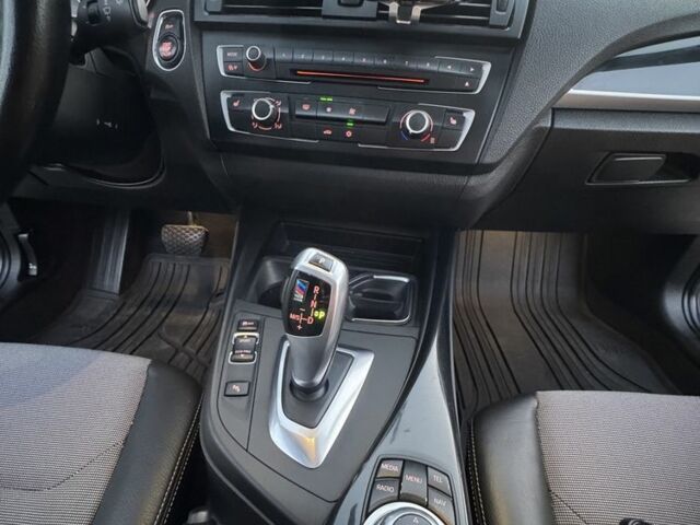 Белый БМВ 1 Серия, объемом двигателя 1.6 л и пробегом 200 тыс. км за 11300 $, фото 6 на Automoto.ua