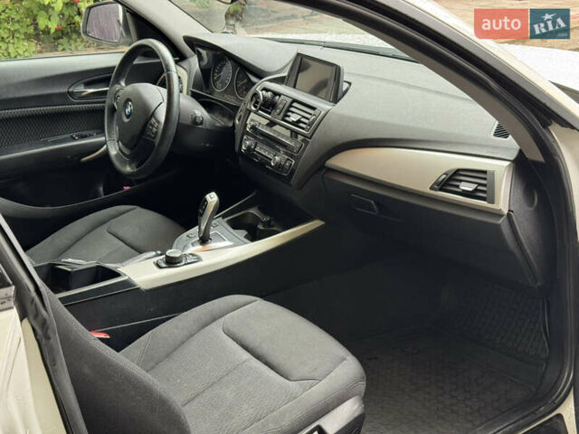 Белый БМВ 1 Серия, объемом двигателя 1.5 л и пробегом 170 тыс. км за 13400 $, фото 4 на Automoto.ua