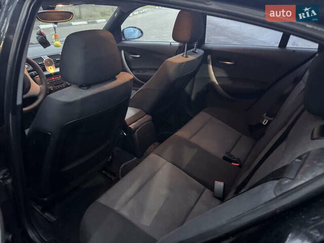 Черный БМВ 1 Серия, объемом двигателя 1.6 л и пробегом 311 тыс. км за 5200 $, фото 12 на Automoto.ua
