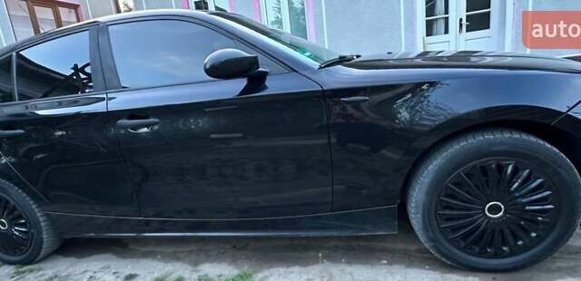 Черный БМВ 1 Серия, объемом двигателя 1.6 л и пробегом 227 тыс. км за 4450 $, фото 5 на Automoto.ua