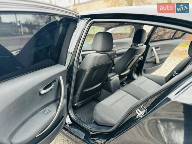 Черный БМВ 1 Серия, объемом двигателя 2 л и пробегом 273 тыс. км за 6300 $, фото 11 на Automoto.ua