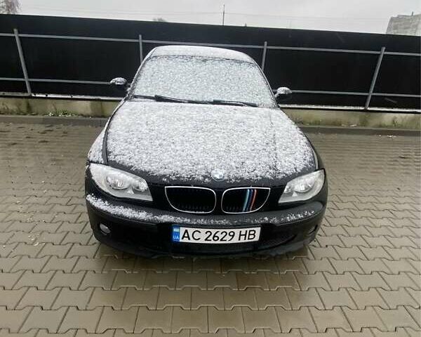 Черный БМВ 1 Серия, объемом двигателя 2 л и пробегом 200 тыс. км за 3500 $, фото 1 на Automoto.ua