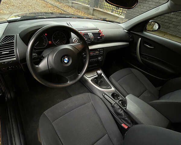 Черный БМВ 1 Серия, объемом двигателя 1.6 л и пробегом 219 тыс. км за 5000 $, фото 11 на Automoto.ua