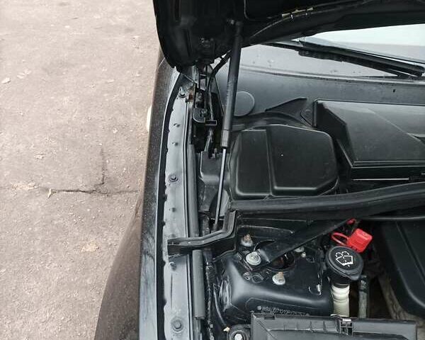 Черный БМВ 1 Серия, объемом двигателя 2 л и пробегом 307 тыс. км за 5800 $, фото 40 на Automoto.ua