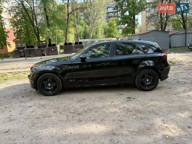 Черный БМВ 1 Серия, объемом двигателя 1.6 л и пробегом 233 тыс. км за 6900 $, фото 1 на Automoto.ua