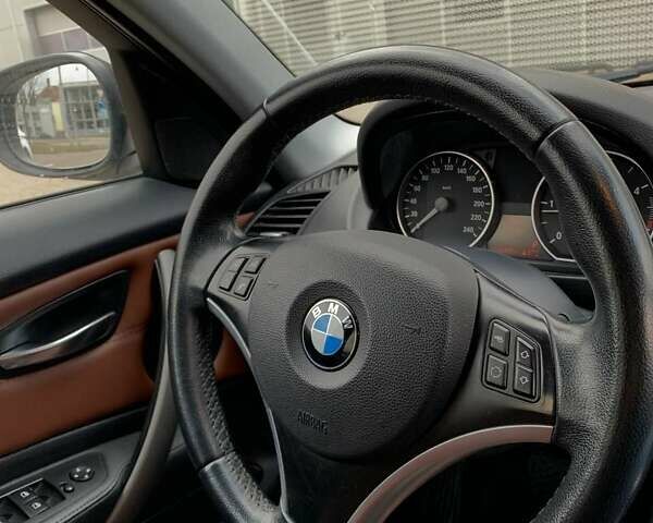 Черный БМВ 1 Серия, объемом двигателя 2 л и пробегом 210 тыс. км за 9000 $, фото 14 на Automoto.ua