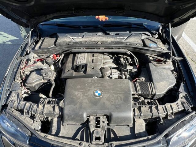 Черный БМВ 1 Серия, объемом двигателя 2 л и пробегом 147 тыс. км за 6500 $, фото 5 на Automoto.ua