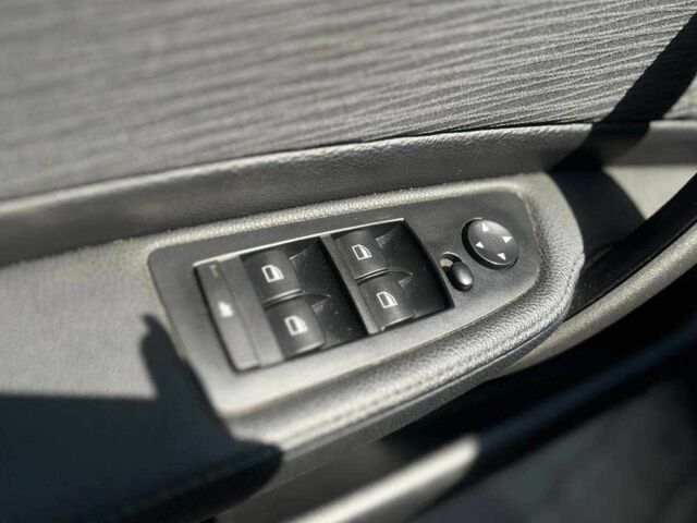 Черный БМВ 1 Серия, объемом двигателя 2 л и пробегом 319 тыс. км за 8200 $, фото 9 на Automoto.ua