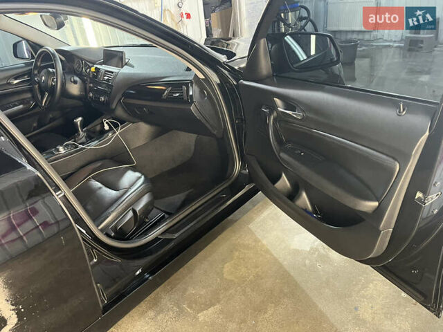 Черный БМВ 1 Серия, объемом двигателя 1.6 л и пробегом 296 тыс. км за 8300 $, фото 3 на Automoto.ua