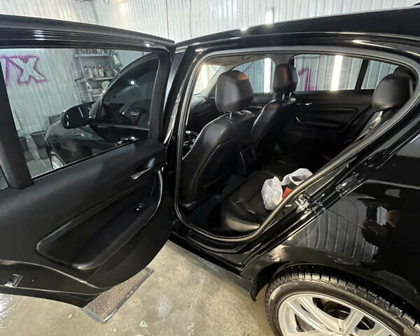 Черный БМВ 1 Серия, объемом двигателя 1.6 л и пробегом 296 тыс. км за 8300 $, фото 6 на Automoto.ua