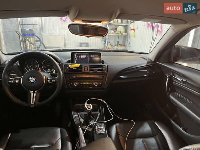 Черный БМВ 1 Серия, объемом двигателя 1.6 л и пробегом 296 тыс. км за 8300 $, фото 1 на Automoto.ua