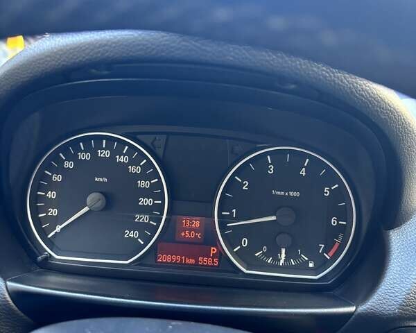 Черный БМВ 1 Серия, объемом двигателя 2 л и пробегом 209 тыс. км за 8500 $, фото 4 на Automoto.ua