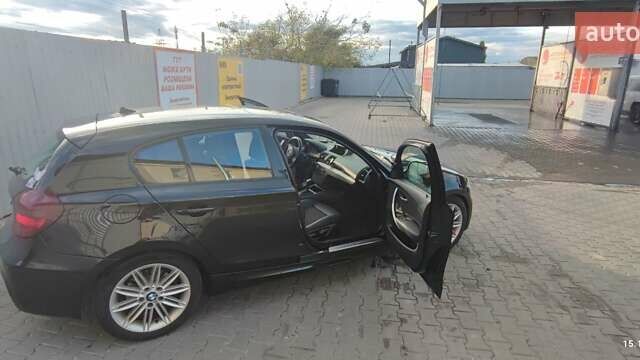 Черный БМВ 1 Серия, объемом двигателя 2 л и пробегом 276 тыс. км за 9850 $, фото 4 на Automoto.ua